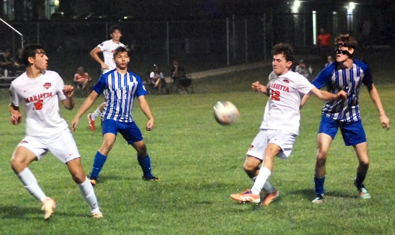 Second-half surge propels Marietta past Warren, 2-0